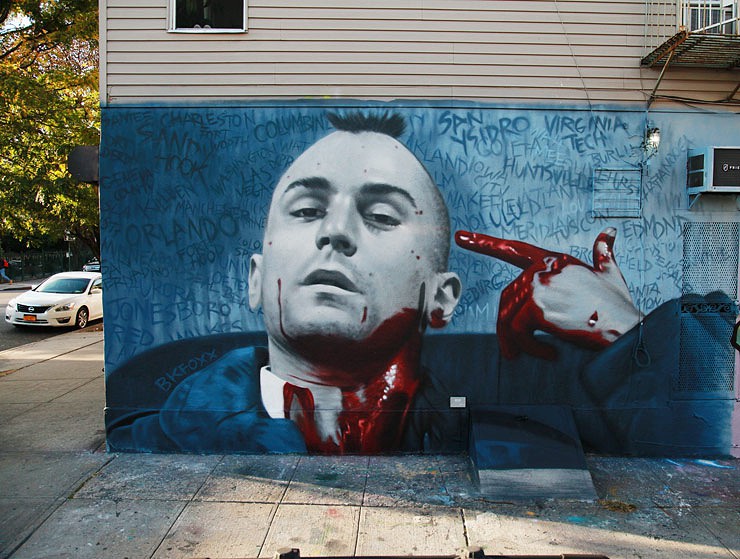 BK Foxx creates this new mural on gun violence in our country, which glamorizes guns and violence in its movies, TV programs, games, and music videos..jpg